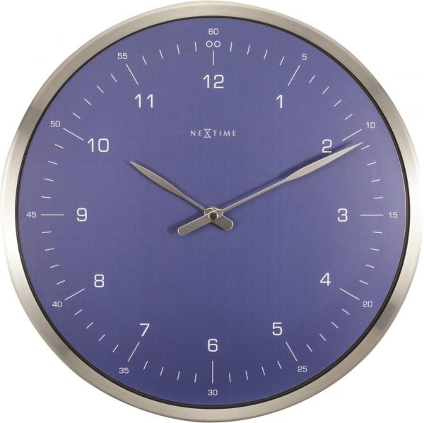 The stunning blue gives a modern look to this traditional wall clock