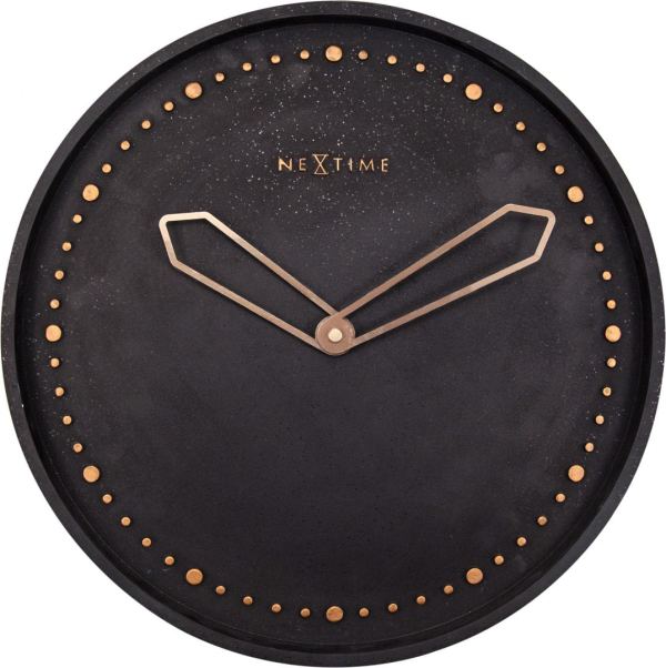 Rose gold elements over black concrete, to give an unusual and modern wall clock