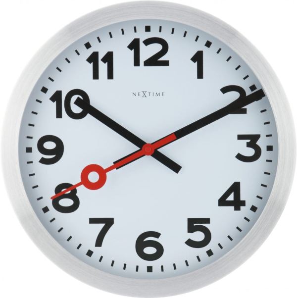 Black numbers and hands, and a clear red second hand, make the Station very clear and easy to read.