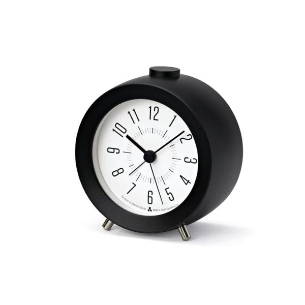 Small but functional black alarm clock with white face.