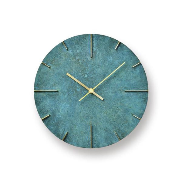 Brass with green finish, strong colours and textures with polished areas to show the detail