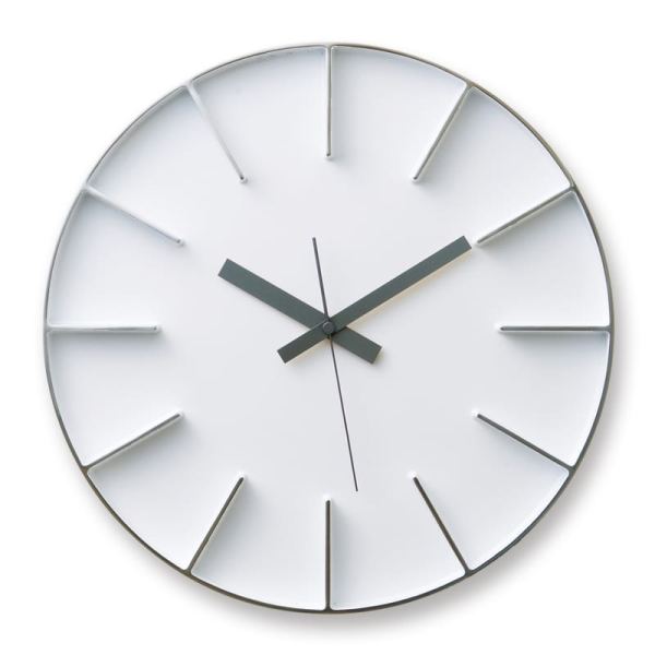 white face, with polished aluminium hour markers and contrasting black hands