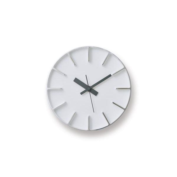 diminutive white aluminium clock with polished markers and black hands