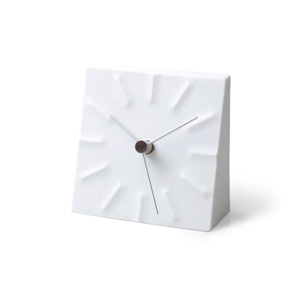 The clock is designed to create a sensation of tension, white in porcelain