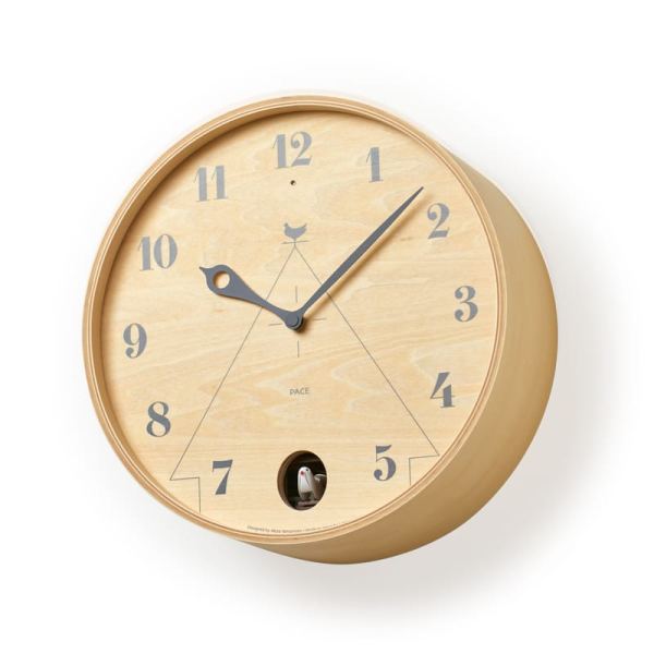 Unusual cuckoo clock with a birdhouse detailed on the face, and the cuckoo sitting at the number 6, in natural colour