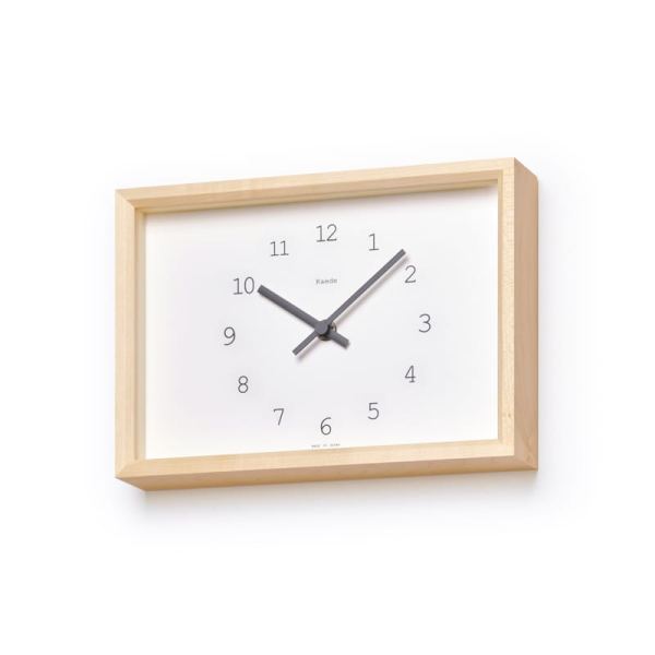 Round dial with a rectangular frame, in which with maple frame