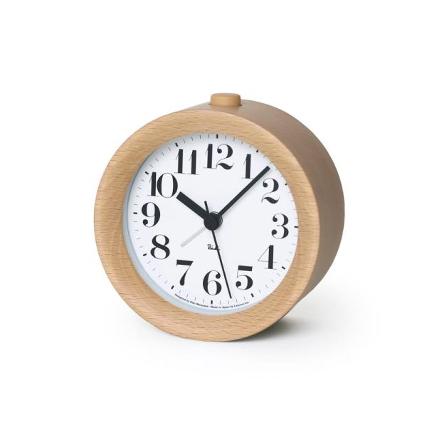Lovely smooth natural coloured beech creates the round frame, with a white face that has black chunky numbers.