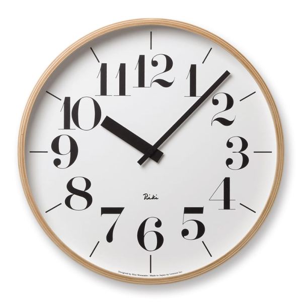 Large Riki Clock with clear easy to read numbers in black, and a natural plywood frame