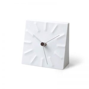 The clock is designed to create a sensation of tension, white in porcelain