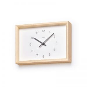 Round dial with a rectangular frame, in which with maple frame