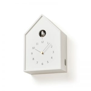 White birdhouse, a stunning example of a modern cuckoo clock, with a unique sound
