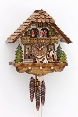 Music accompanies the dances and moving waterwheel, and as the cuckoo marks the hour, the woodcutter chops the wood