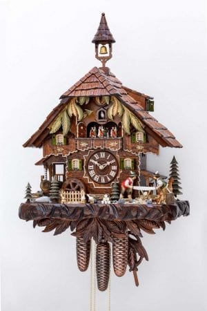 woodmill scene with two sawyers, richly decorated chalet with belltower and hand carved detail