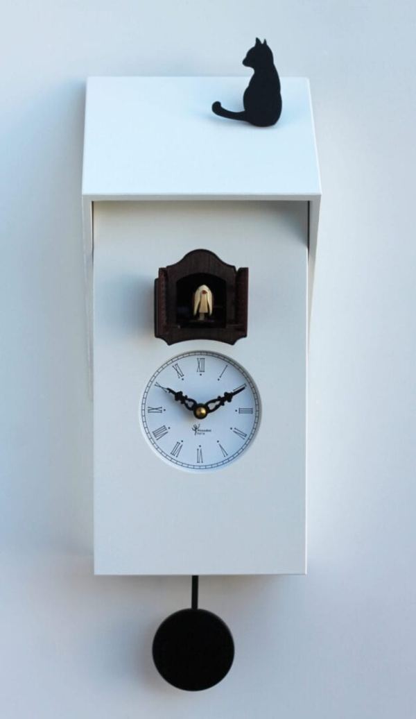White mdf cuckoo clock with a black pendulum and cat