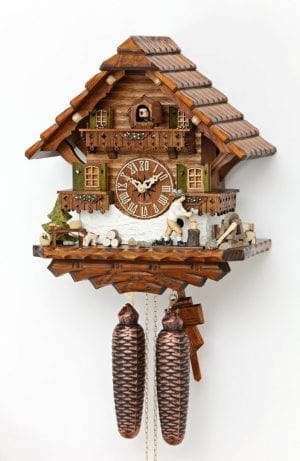 This clock features a woodcutter hard at work outside his chalet