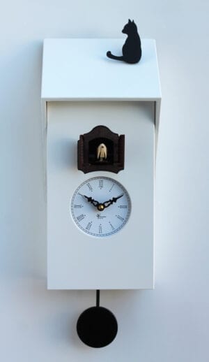White mdf cuckoo clock with a black pendulum and cat