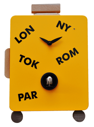 Quirky and unusual cuckoo clock in teh style of a travel case, in melon yellow with solid beech details and black print