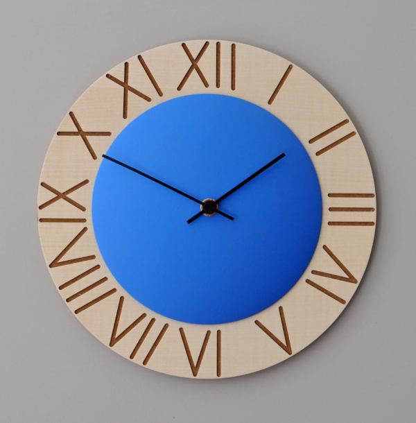 A bright blue disk brings your attention to this clock, which has roman numerals etched into a wooden surround
