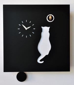 A black clock with white cat, waiting for the cuckoo, and white clock face
