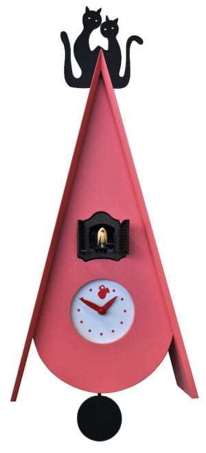 lilac pink clock in the shape of a bird house, with two cats on the roof