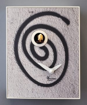 A black image on a grey background, in the style of Grafitti