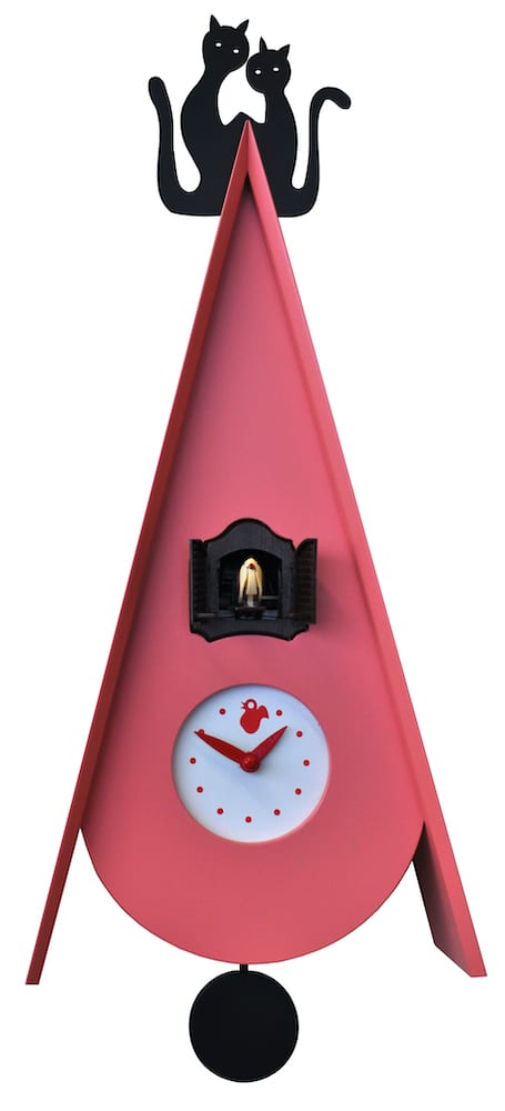 lilac pink clock in the shape of a bird house, with two cats on the roof