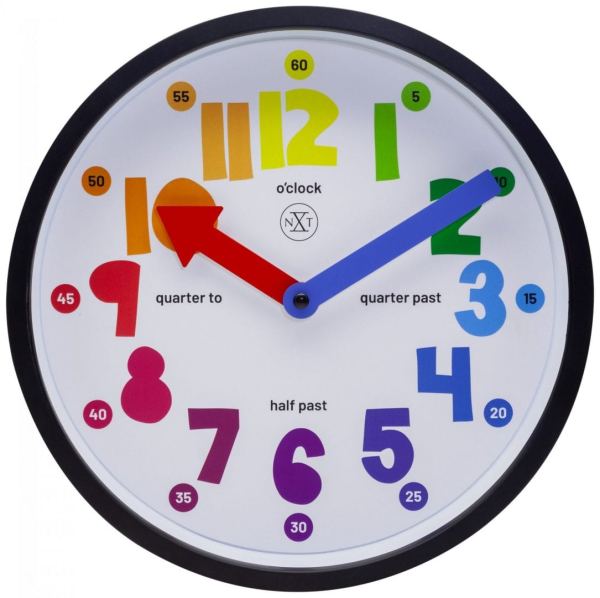 A brightly coloured wall clock with red and blue hands and a black case. The numbers are bold and the face also features the half and quarter hours for teaching purposes