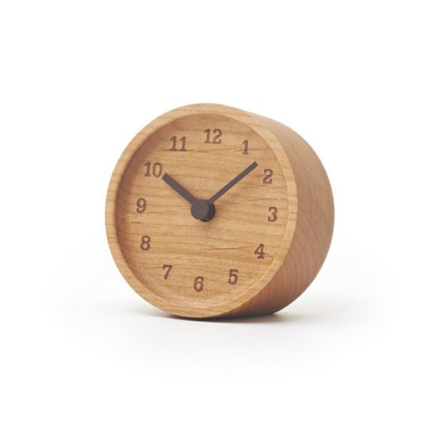 Repurposed alder is the material used for this small and individual clock
