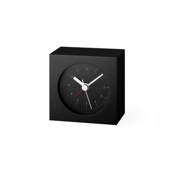Sophisticated alarm clock in black with a black face, and contrasting white hands.