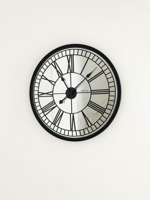 Alternative view of Cleopatra wall clock, showing the clock against a white background