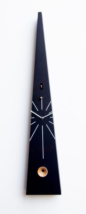 Tall cuckoo clock in black, a very narrow triangular shape, 90 cm tall, with a cuckoo housed at the top, white markings on the face and oversized hands to add to its quirky appeal