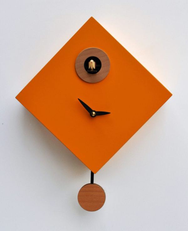 Rombino cuckoo clock in orange-yellow, with wooden detail and black hands