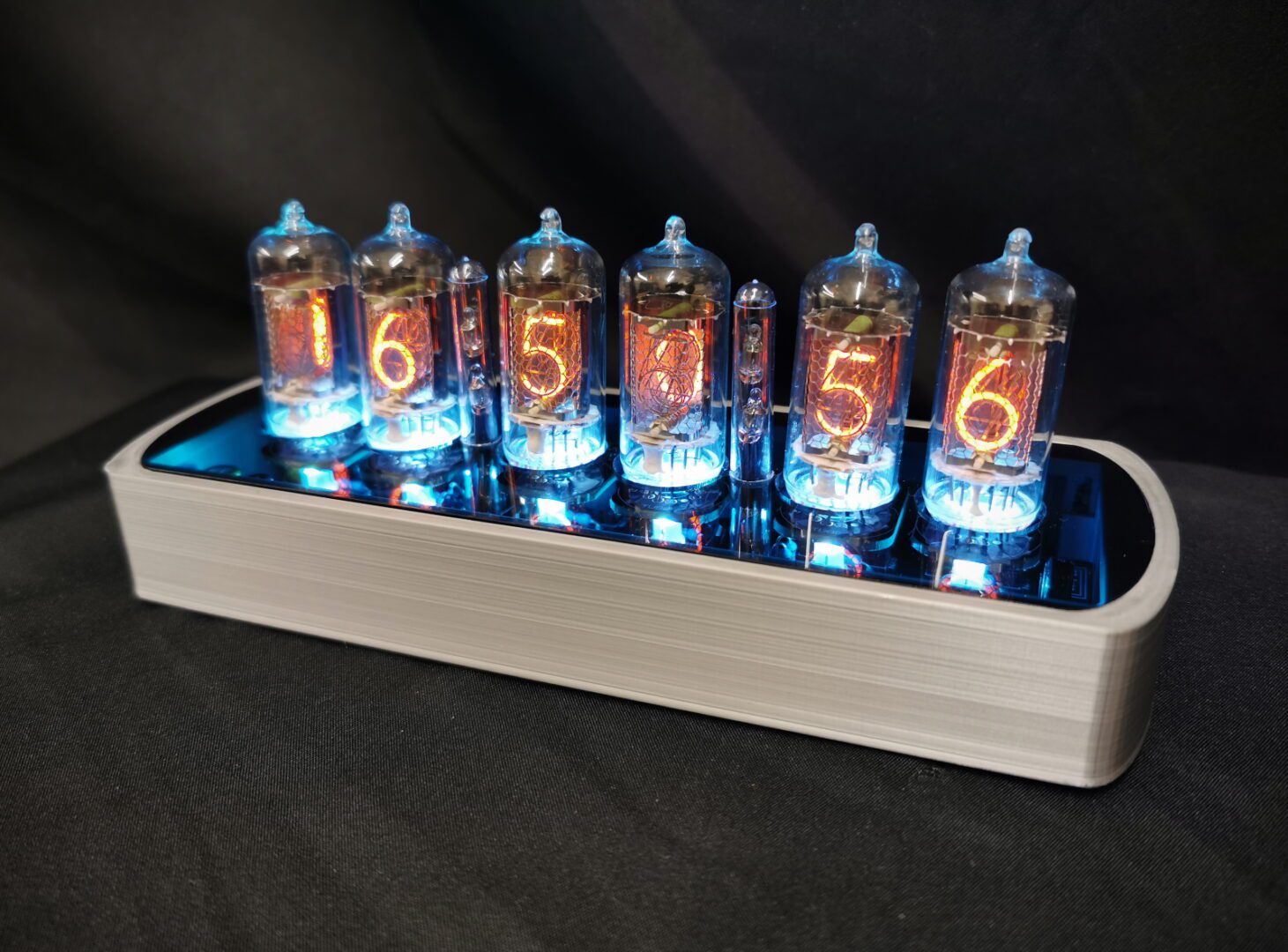Genesis Ss with blue backlit nixie tubes