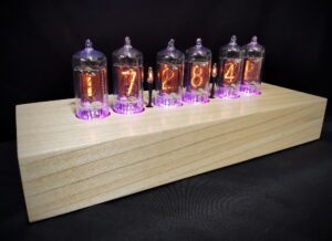 cadence clock in tulipwood, with pink backlit RGB nixie tubes