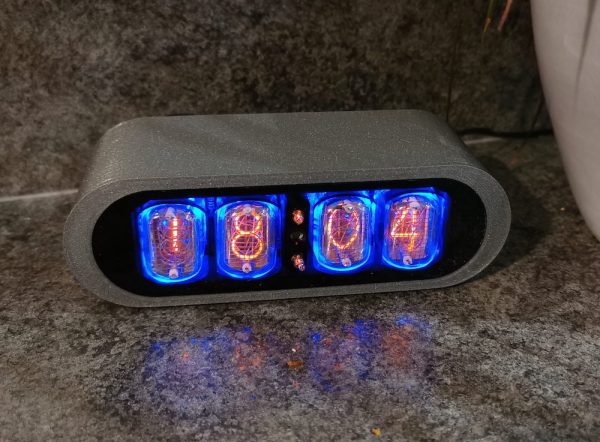 Anthracite coloured POD clock, polished 3D printed case with 4 nixie tubes to display the time and date
