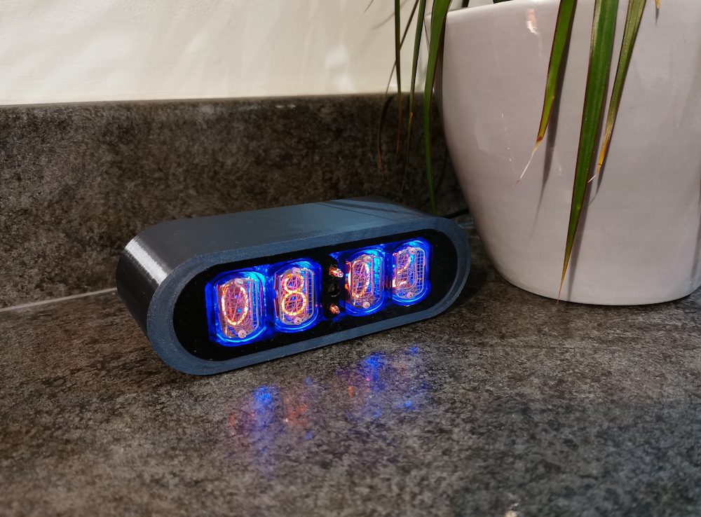 Chrome coloured POD nixie clock, with polished 3D case
