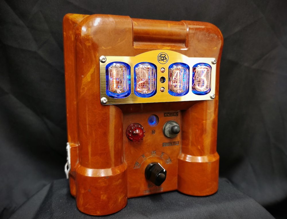 Viewed slightly from the left, a view of the geiger mini clock, showing nixie tubes and bakelite construction of the case