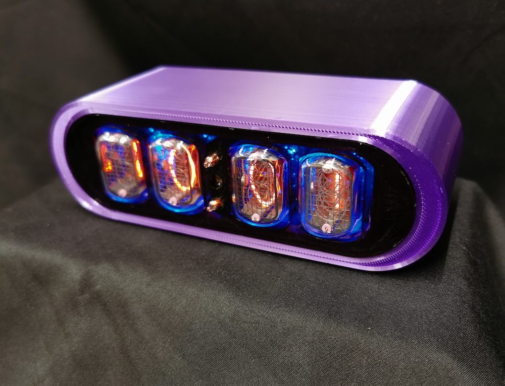 Viewed from RHS, the purple POD nixie clock showing detailing on the case