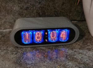 Anthracite coloured POD clock, polished 3D printed case with 4 nixie tubes to display the time and date