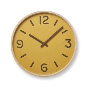 Yellow and Wood Thomson Wall Clock. the numbers are paper cup to reveal the wood underneath