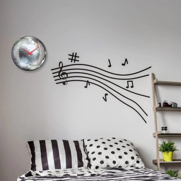Disco ball wall clock shown in a room setting