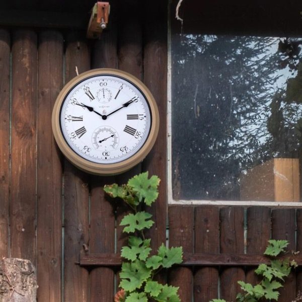 Hyacynth weatherstation clock shown in an outdoor setting