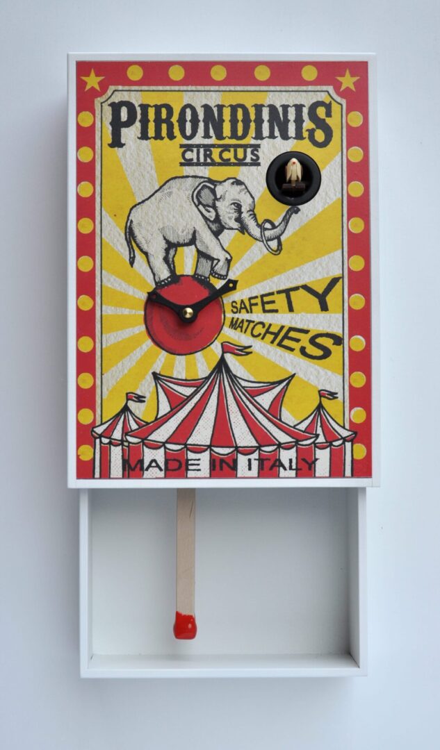 An extremely unusual cuckoo clock in the form of a matchbox with a circus design.
