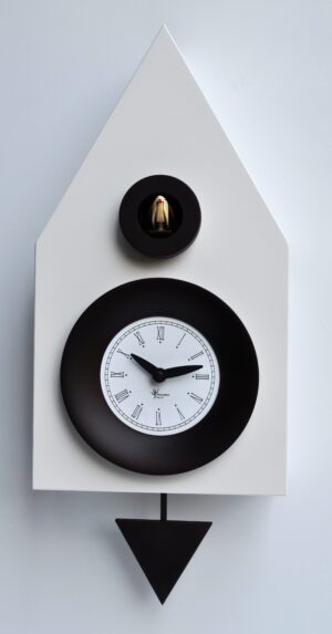 Cement Grey coloured cuckoo clock with ebony black surrounds to the clock face and cuckoo house and ebony black pendulum