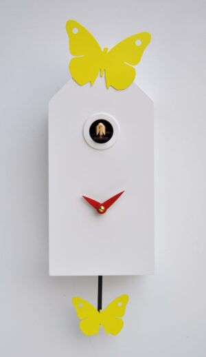 White house shaped cuckoo clock with yellow butterflies and orange hands.