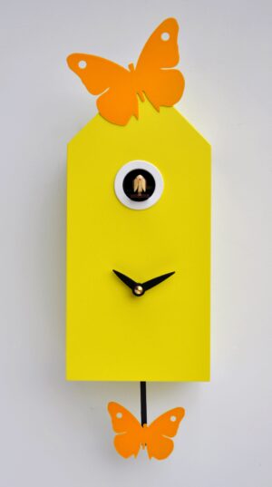 Yellow cuckoo clock with orange butterflies which attach with magnets