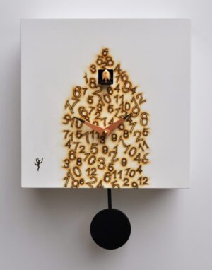Unusual square cuckoo clock with random numbers creating the shape of a house which houses the cuckoo clock. the clock has a black pendulum