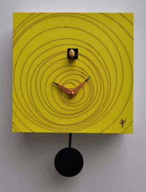 A square yellow cuckoo clock with a vortex design