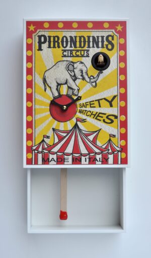 An extremely unusual cuckoo clock in the form of a matchbox with a circus design.